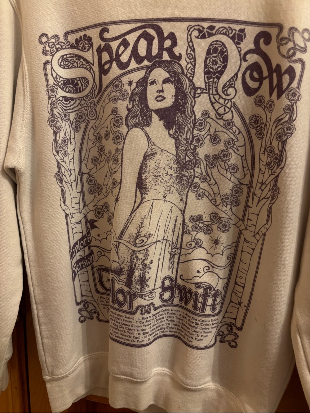 Taylor Swift Cream Sweatshirt with Purple Graphic